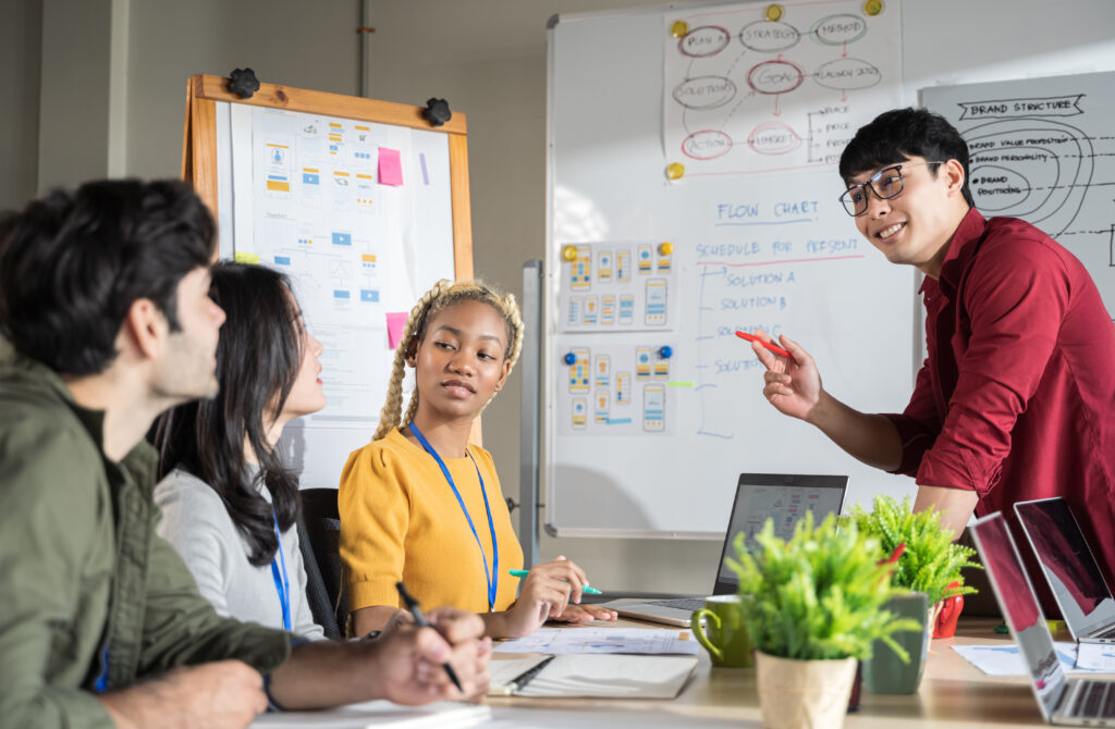 asian-man-creative-business-present-their-work-to-2025-01-09-01-12-55-utc - Home Builder Marketers